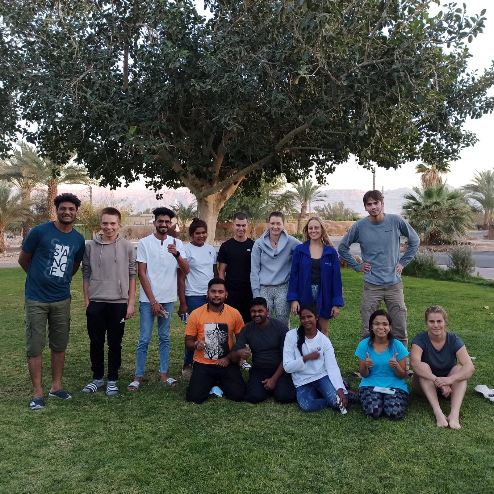 Indian and international students together on campus lawn