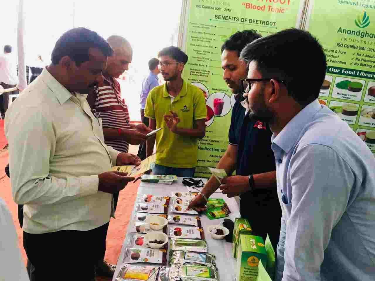 GreenRoot exhibition booth showcasing organic agricultural products